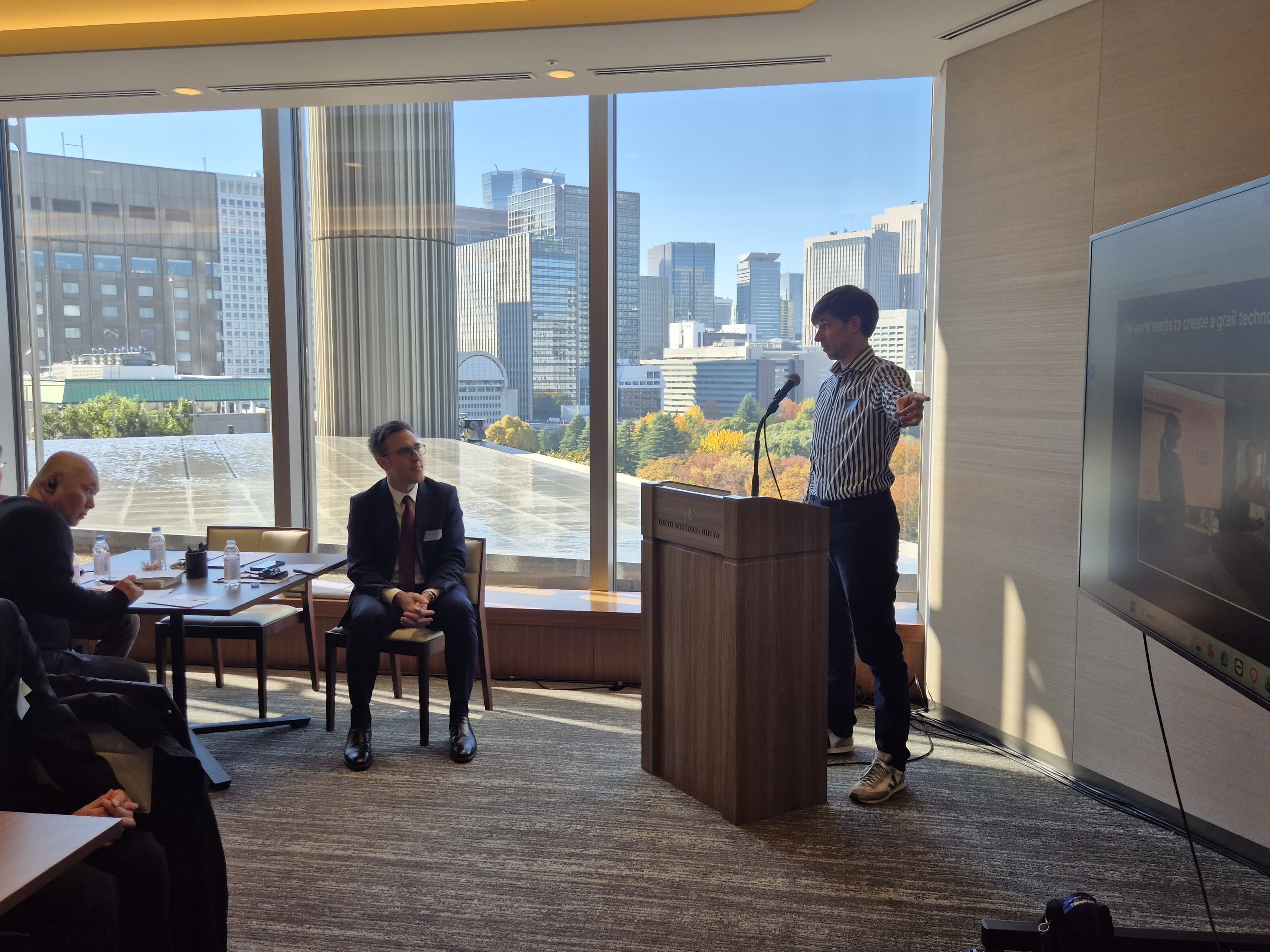 Florian Meloux, Founder and CEO of CLERC, speaking at a podium about sign language AI